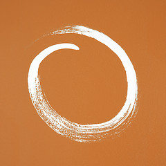 Image showing White circle painted on orange background