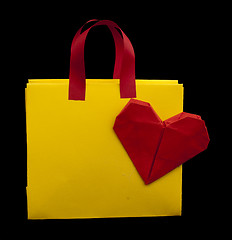 Image showing Yellow shopping bag with red heart