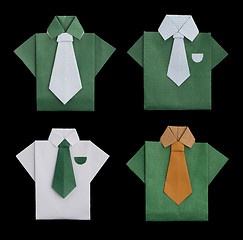 Image showing Set of isolated paper made shirts.