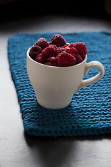 Image showing Fresh raspberries in cup