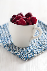 Image showing Fresh raspberries in cup