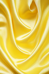 Image showing Smooth elegant golden silk can use as background 