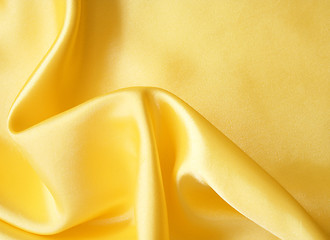 Image showing Smooth elegant golden silk can use as background 