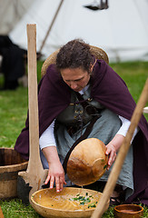 Image showing Medieval Woman Washing the Dishes