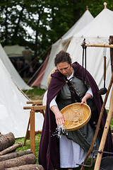 Image showing Medieval Woman Washing the Dishes