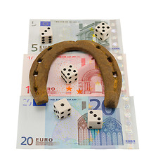 Image showing retro horseshoe gamble dice euro banknote isolated 