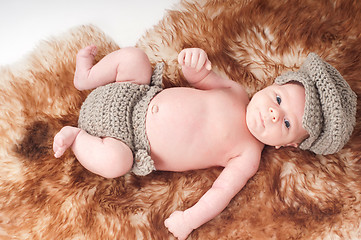 Image showing Newborn baby in knitted wear