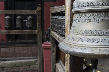 Image showing bell and prayer wheels in nepal