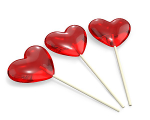 Image showing Three heart shaped lollipops