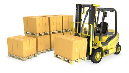 Image showing Yellow fork lift truck with stack of carton boxes