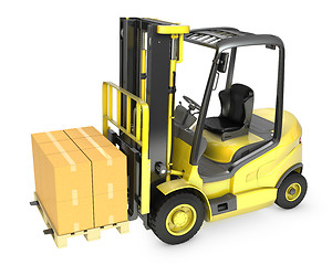 Image showing Yellow fork lift truck with stack of carton boxes