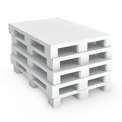 Image showing Stack of white plastic pallets