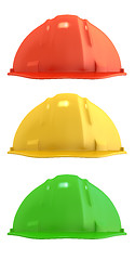 Image showing Three construction helmets colored as traffic light