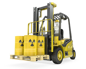 Image showing Fork lift truck with radioactive barrels