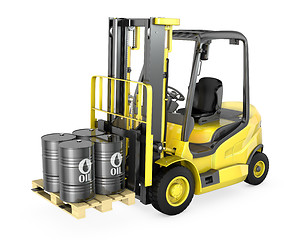 Image showing Yellow fork lift lifts four oil barrels