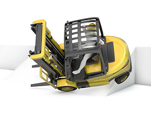 Image showing Yellow fork lift truck falling after turning on slope