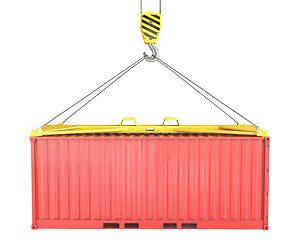 Image showing Freight container hoisted on container spreader