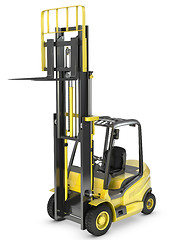 Image showing Yellow fork lift truck with raised fork