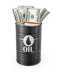 Image showing Barrel of oil with dollars inside