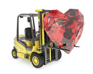 Image showing Fork lift truck lifts heart cut ruby