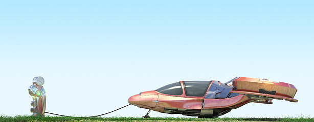 Image showing Futuristic flying car at gas station