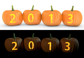 Image showing 2013 text carved on pumpkin jack lantern