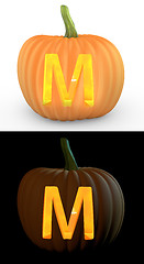 Image showing M letter carved on pumpkin jack lantern