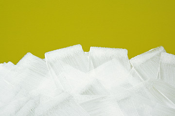 Image showing White brush strokes texture on yellow wall