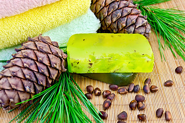 Image showing Soap homemade green with cedar cones