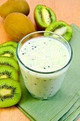 Image showing Milk cocktail with kiwi on a napkin
