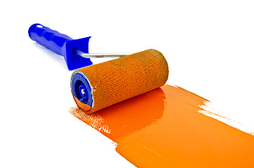 Image showing Roller with orange paint