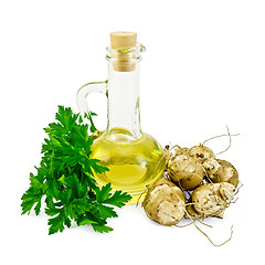 Image showing Jerusalem artichokes with oil and parsley