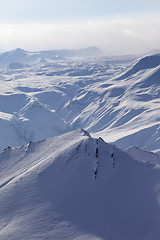 Image showing Snowy mountains in haze