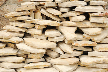 Image showing Heap of flat paving stones, limestone