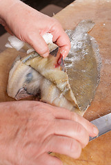 Image showing Removing skin from a sole