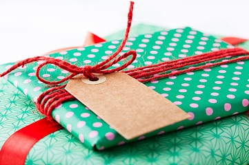 Image showing Wrapped gifts with tag