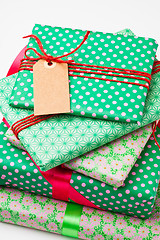 Image showing Wrapped gifts with tag
