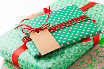 Image showing Wrapped gifts with tag