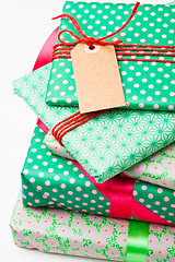 Image showing Wrapped gifts with tag