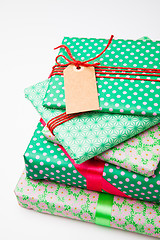 Image showing Wrapped gifts with tag