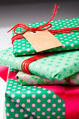 Image showing Wrapped gifts with tag