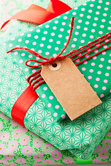 Image showing Wrapped gifts with tag