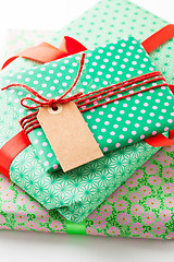 Image showing Wrapped gifts with tag