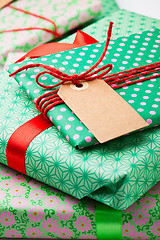 Image showing Wrapped gifts with tag