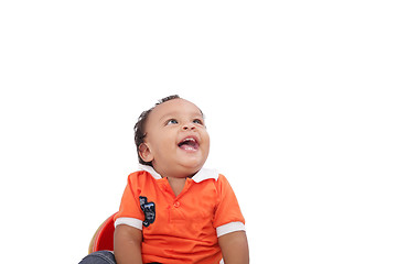 Image showing Baby laughing over white background. Active one year child 