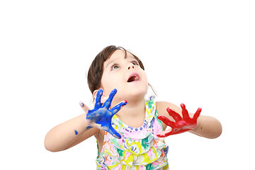 Image showing Learning and play themed image of a little girl with hands paint