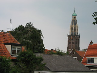 Image showing weird tree and leaning church tower