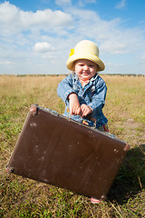 Image showing lonely girl with suitcase