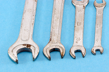 Image showing set size wrench screw tools on blue 