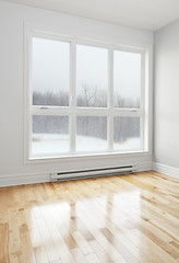 Image showing Empty room and winter landscape seen through the window